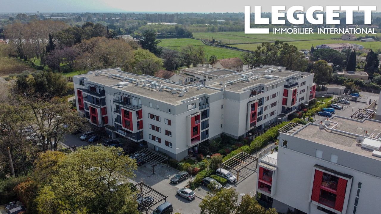 Appartement de style T2 avec loggia dans une résidence sécurisée, vendu avec 2 place de parking