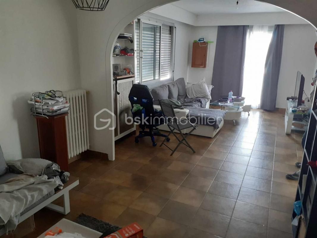 Appartement 85m² avec balcon et jardin