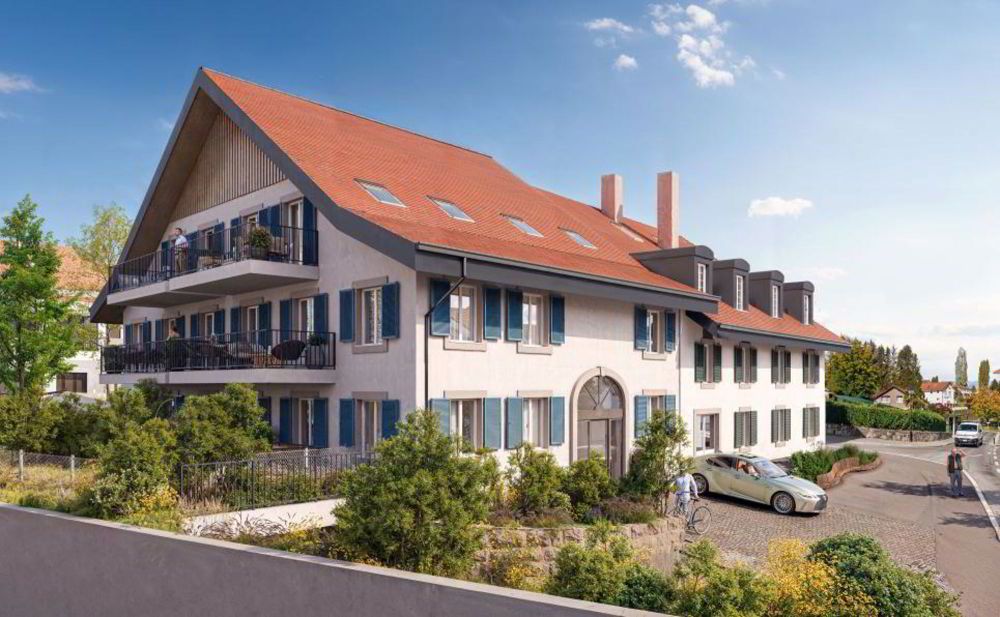 Dans petite PPE au centre du village, appartement de 2,5 pièces une terrasse jardin privé