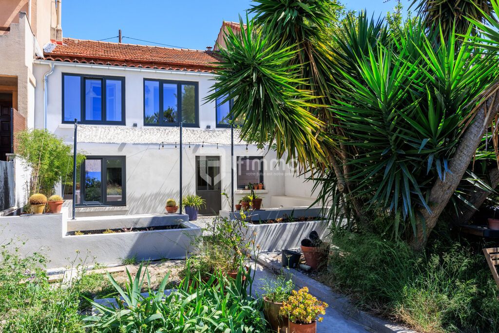 Un jardin dans le 4ème - Maison de ville  - 110m2