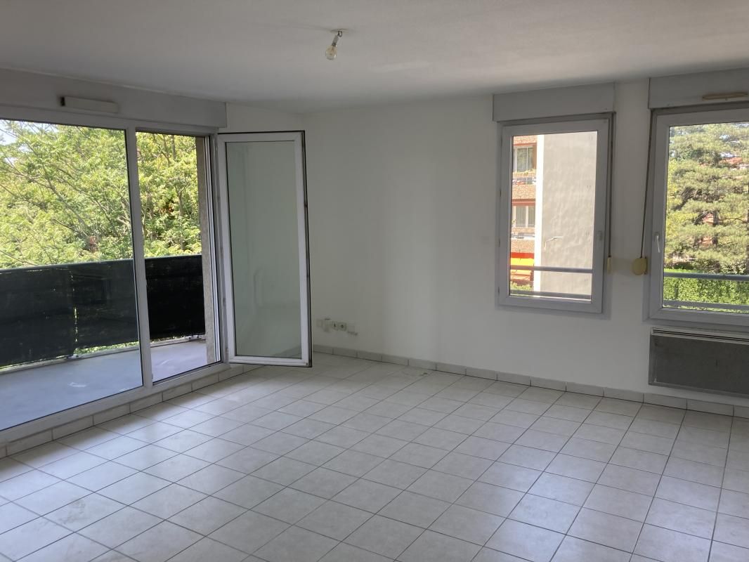 Appartement T3 de 67 m² avec balcons, proche des commerces