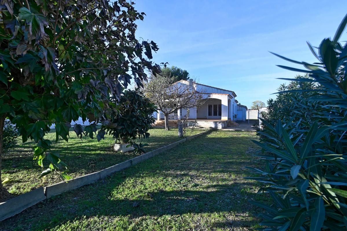 Maison individuelle de 122 m² avec jardin, terrasse et garage à Aimargues