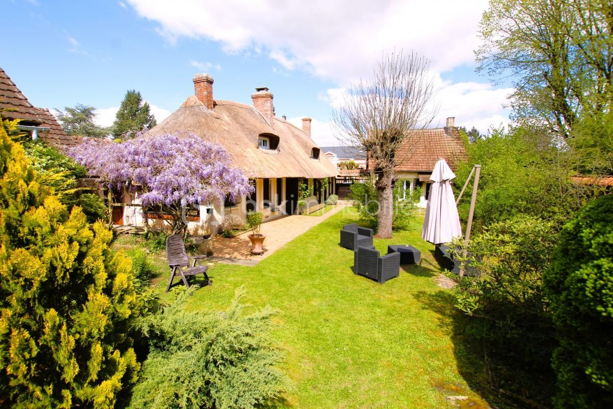 PROPRIÉTÉ DE CHARME une maison de 138 m² et une seconde maison de 24 m² et son grenier de 23 m², un double garage de 45 m², une cave de 17 m², 2 abris de jardin sur terrain clos de 1975 m²