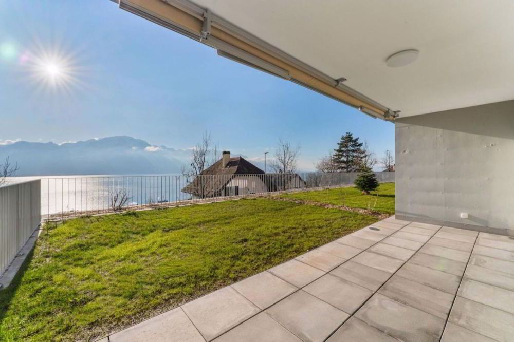 Très bel appartement de 3.5 pièces avec terrasse et jardin avec vue sur le lac.