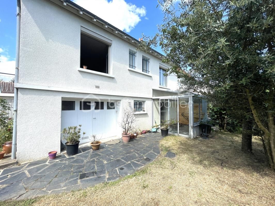 MAISON avec JARDIN - IDÉALEMENT SITUÉE