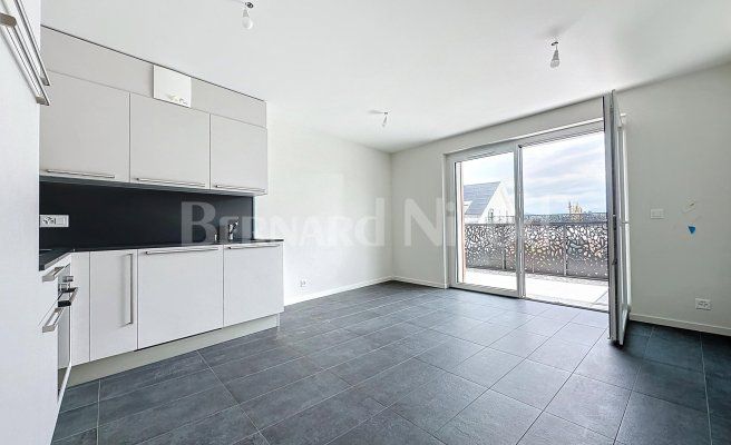 Appartement neuf de 2.5 pièces avec terrasse et jardin