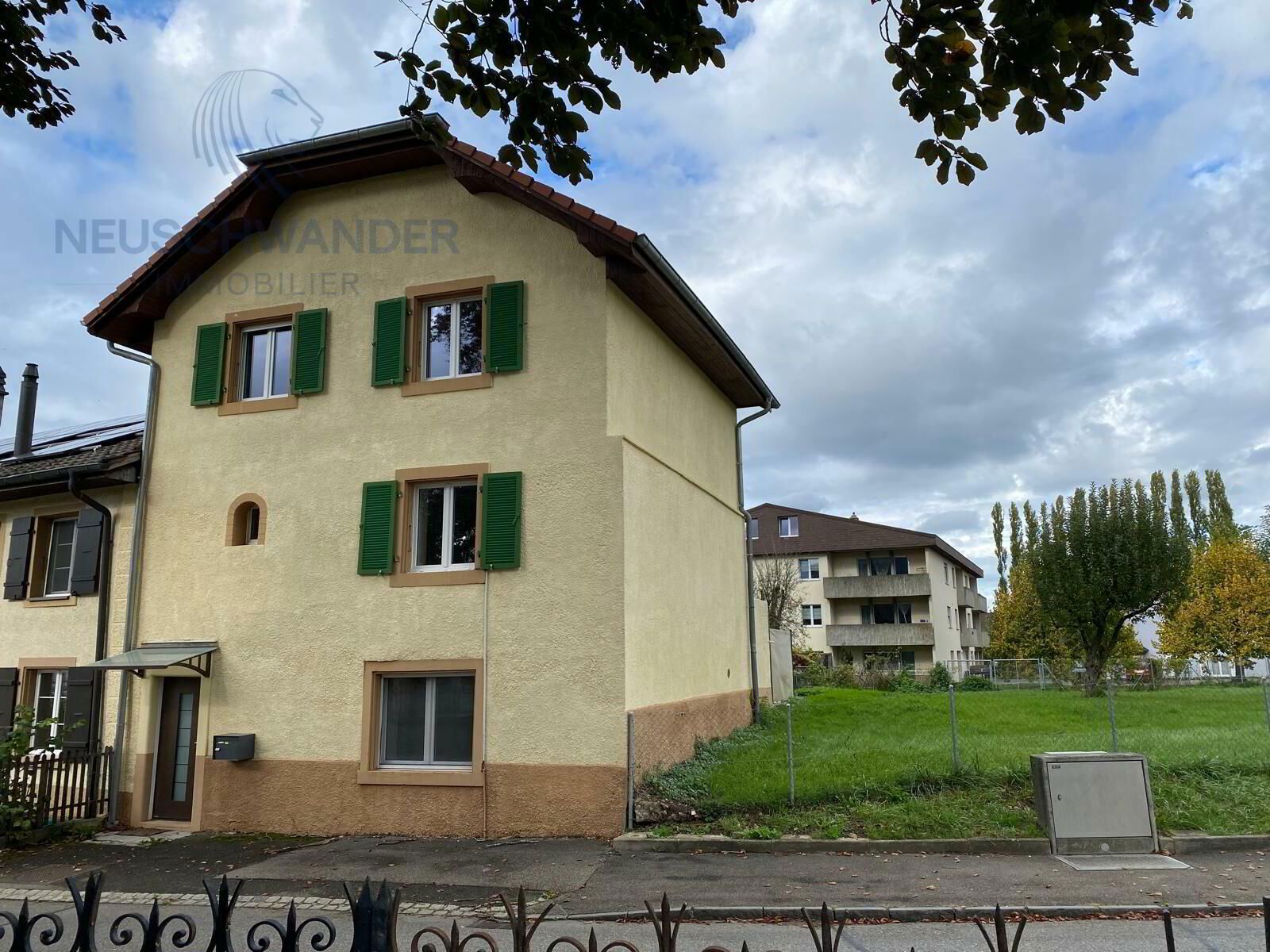 In the center of the village, small house on large building plot