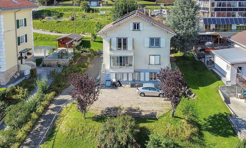 Maison locative de 3 logements avec jardin Quartier